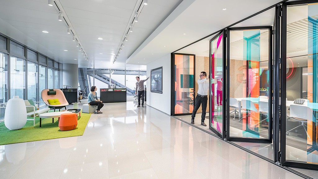 A group of people in a room.